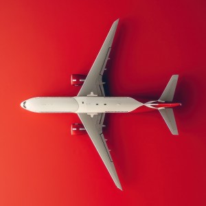 عکس 4k هواپیمای مسافربری با پس زمینه قرمز